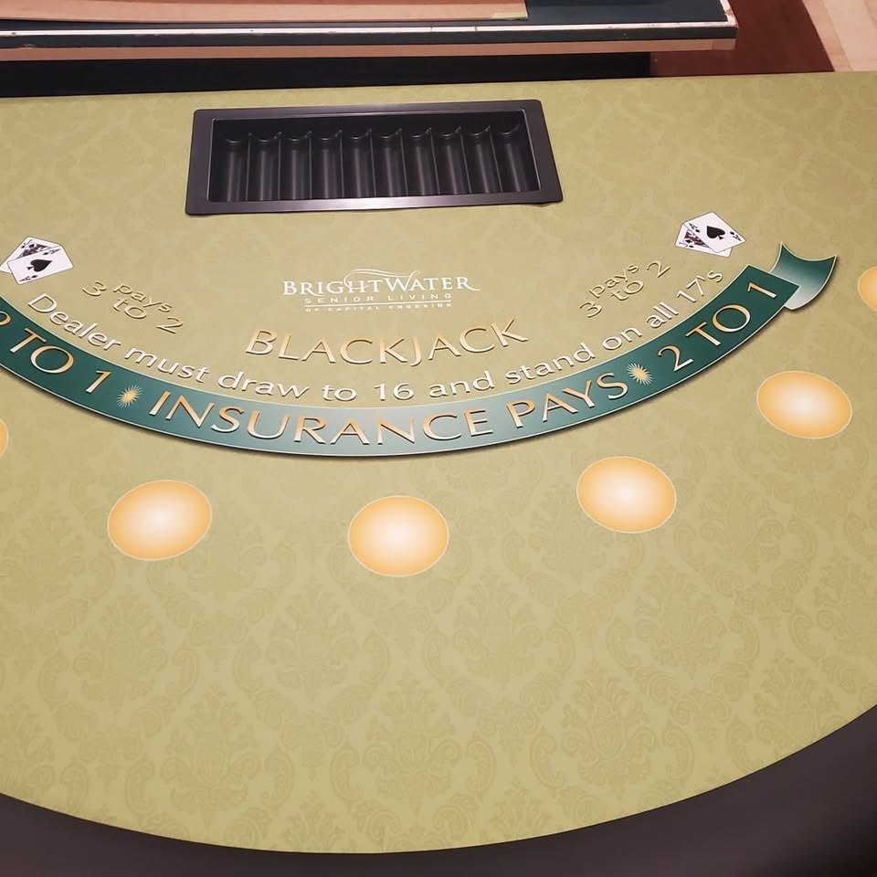 Gray diamond-pattern felt poker table
